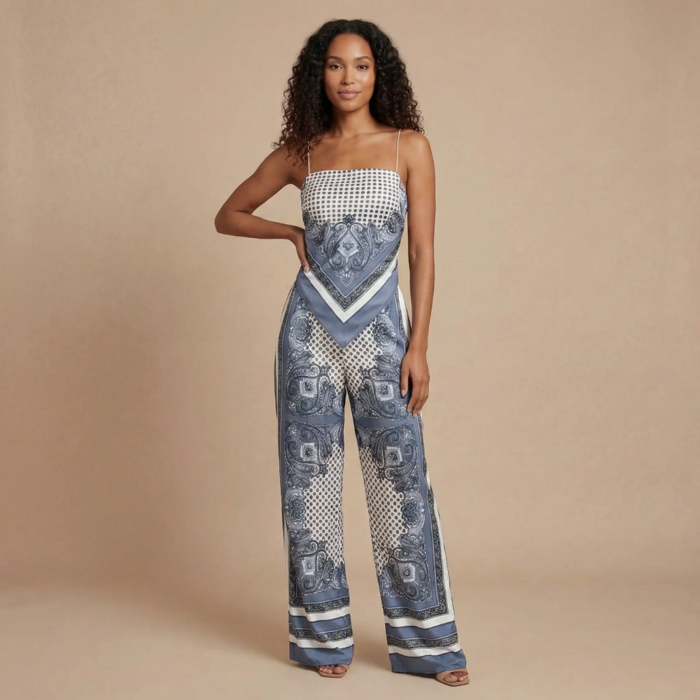 Women wearing navy matching pants set with strapless top and flowing trousers