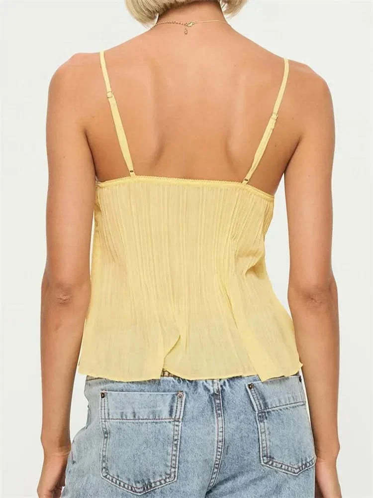 Back view of yellow lace cami showing spaghetti straps
