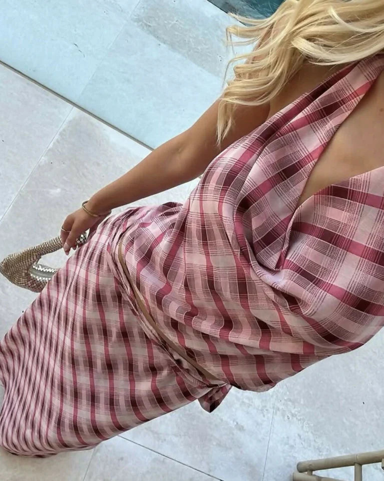 Pink plaid maxi skirt with high waist and flowing fabric drape
