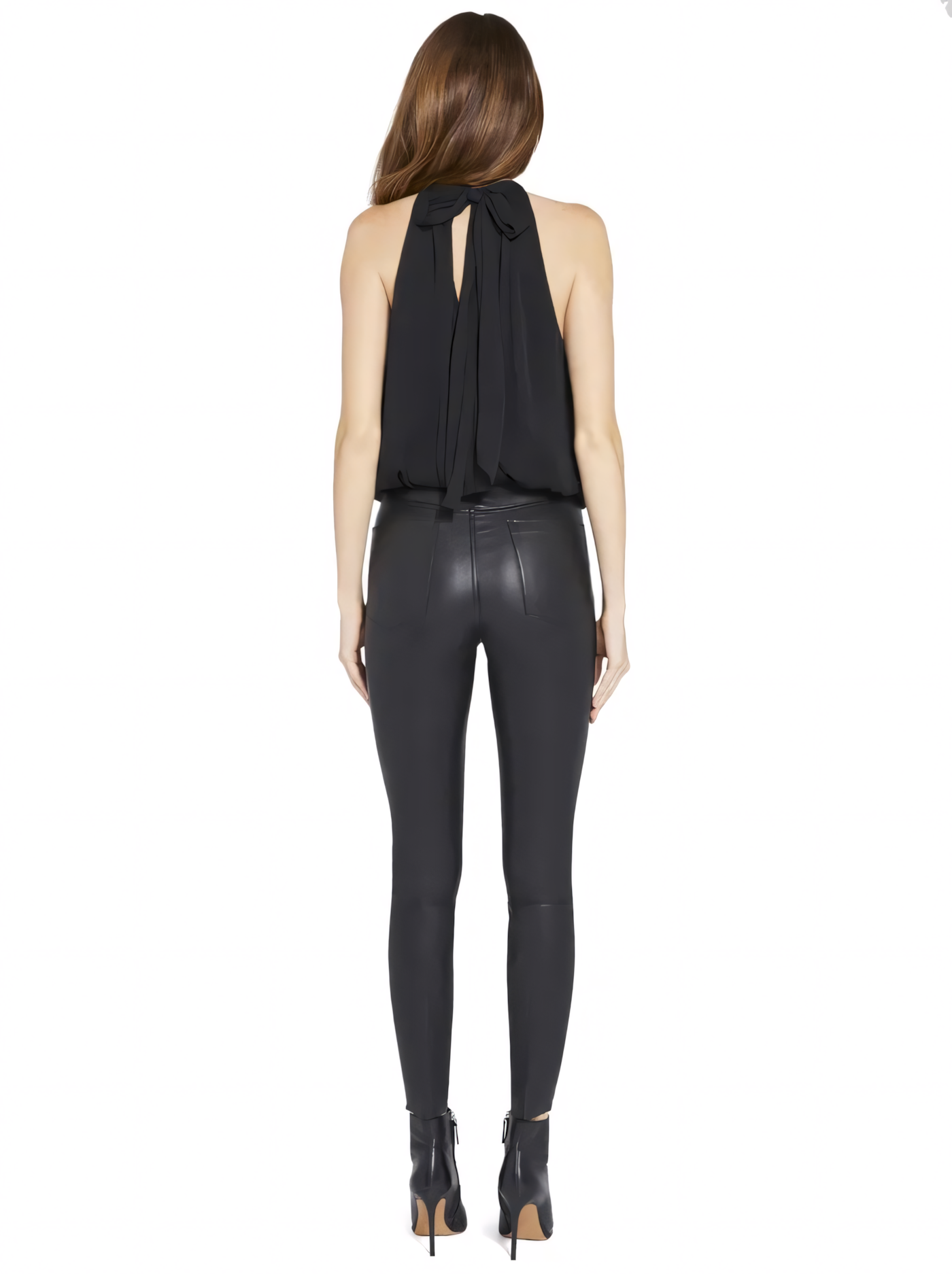 Back view of black pleated halter mini dress with tie closure