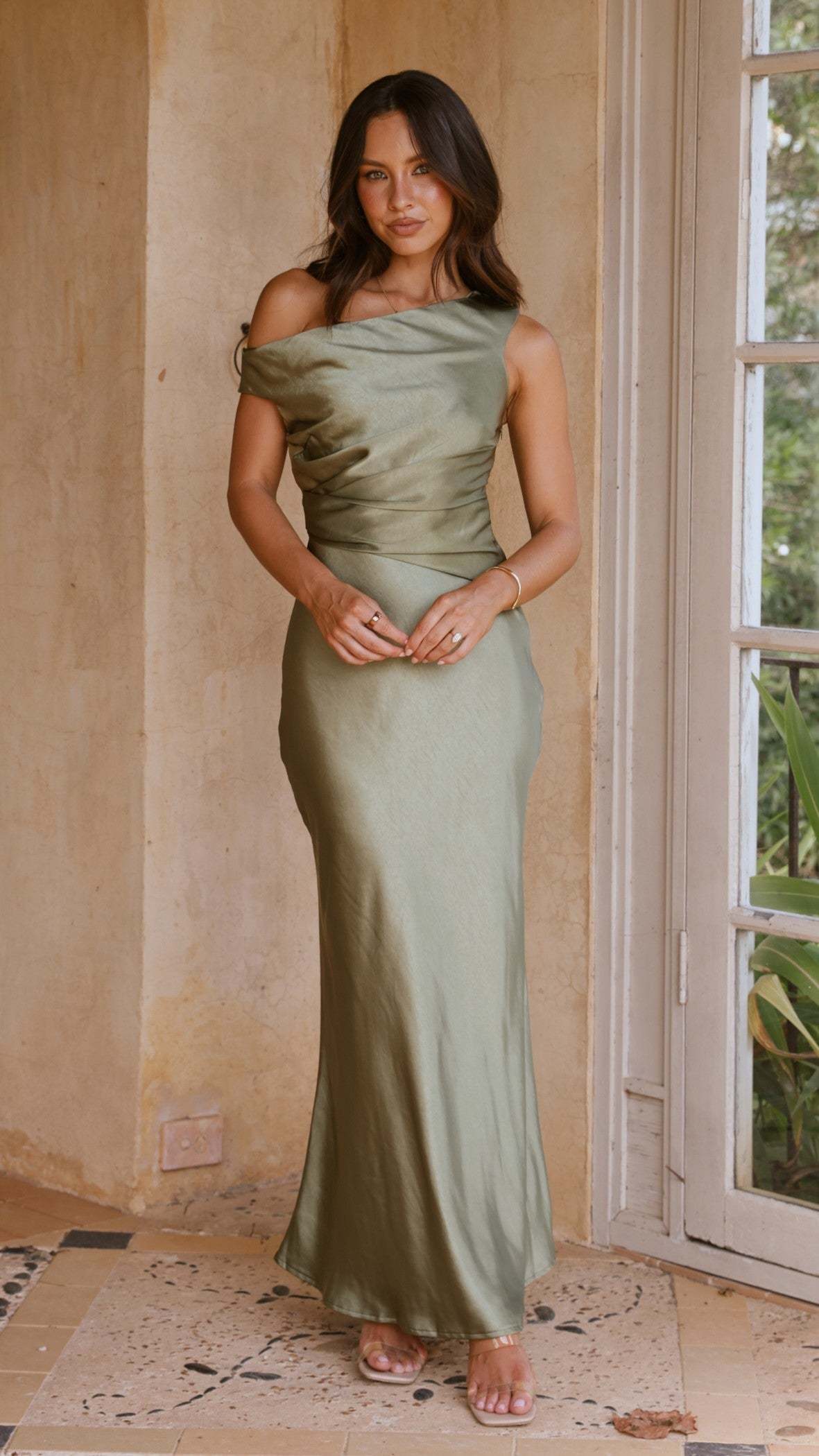 Full-length sage ruched maxi dress with asymmetrical shoulder and ankle length