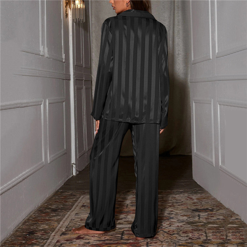 Back view of charcoal striped satin pajama shirt showing vertical stripe pattern