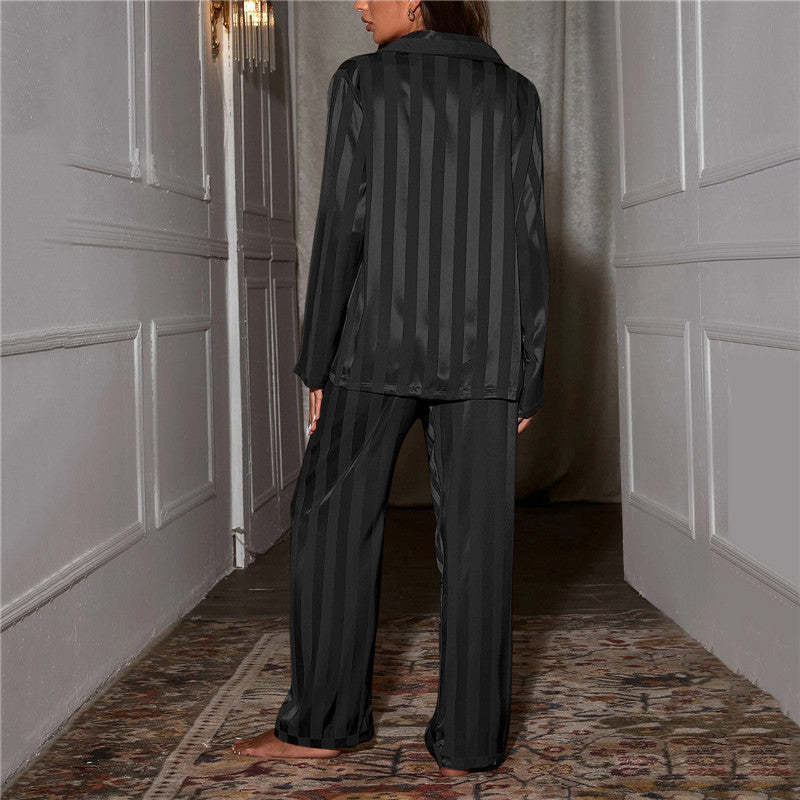 Back view of charcoal striped satin pajama shirt showing vertical stripe pattern