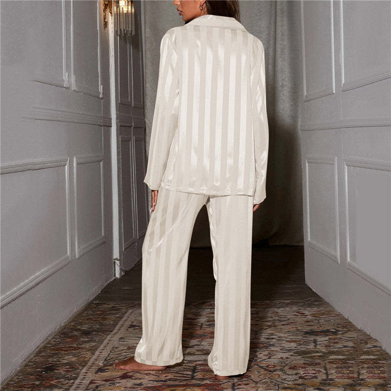 Back view of ivory striped satin pajama shirt displaying vertical stripe texture
