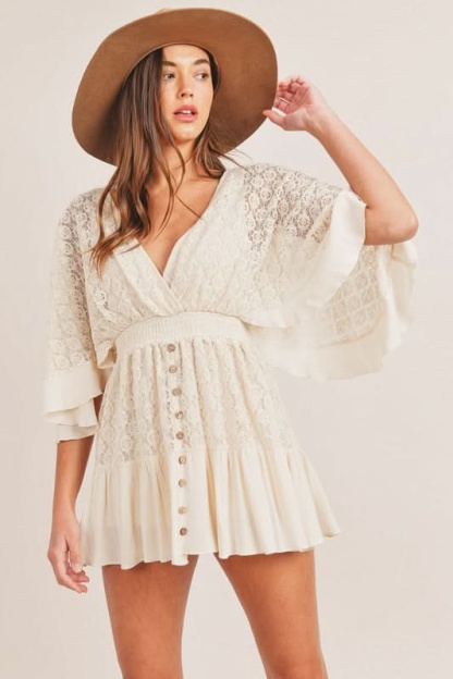 Cream lace romper with flutter sleeves and button-down front detail