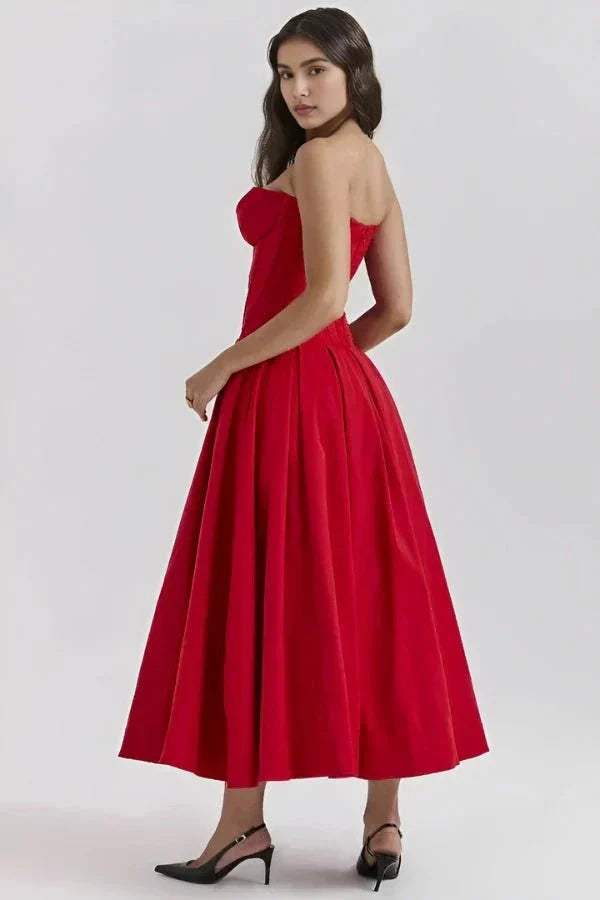 Red strapless corset midi dress with full pleated skirt and open back