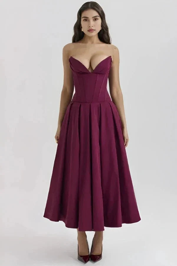 Plum strapless corset midi dress with structured bodice and full A-line skirt