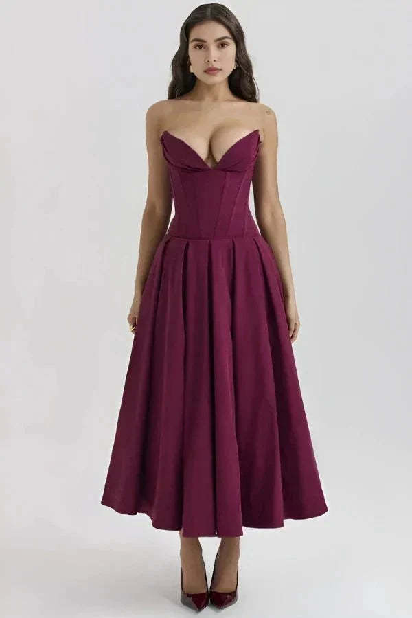 Plum strapless corset midi dress with structured bodice and full A-line skirt