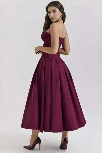 Burgundy corset midi dress back view showing open back and pleated skirt
