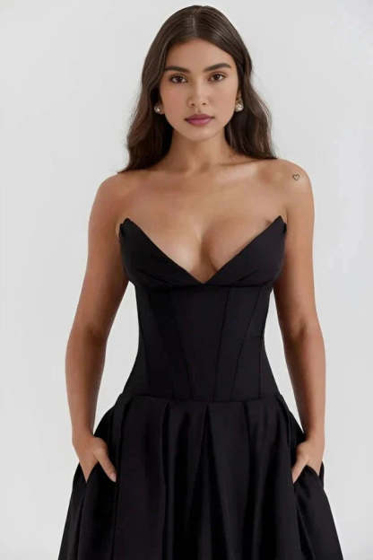 Black strapless corset dress with sweetheart neckline and pocket details