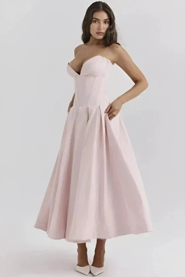 Blush pink strapless corset midi dress with sweetheart neckline and full skirt