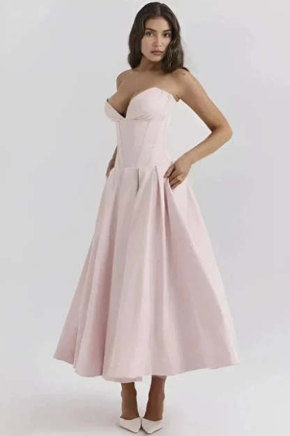 Blush pink strapless corset midi dress with sweetheart neckline and full skirt
