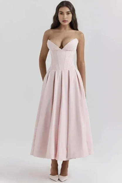 Light pink corset midi dress with structured bodice, sweetheart neckline and pleated skirt