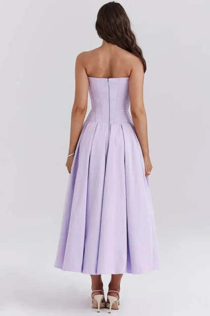 Back view of lavender strapless corset dress with structured bodice and full skirt