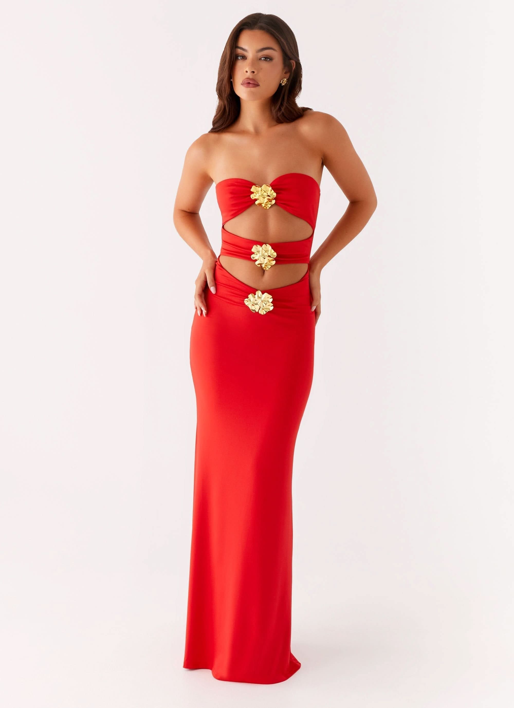 Red strapless cutout maxi dress with gold embellished details and draped bodice