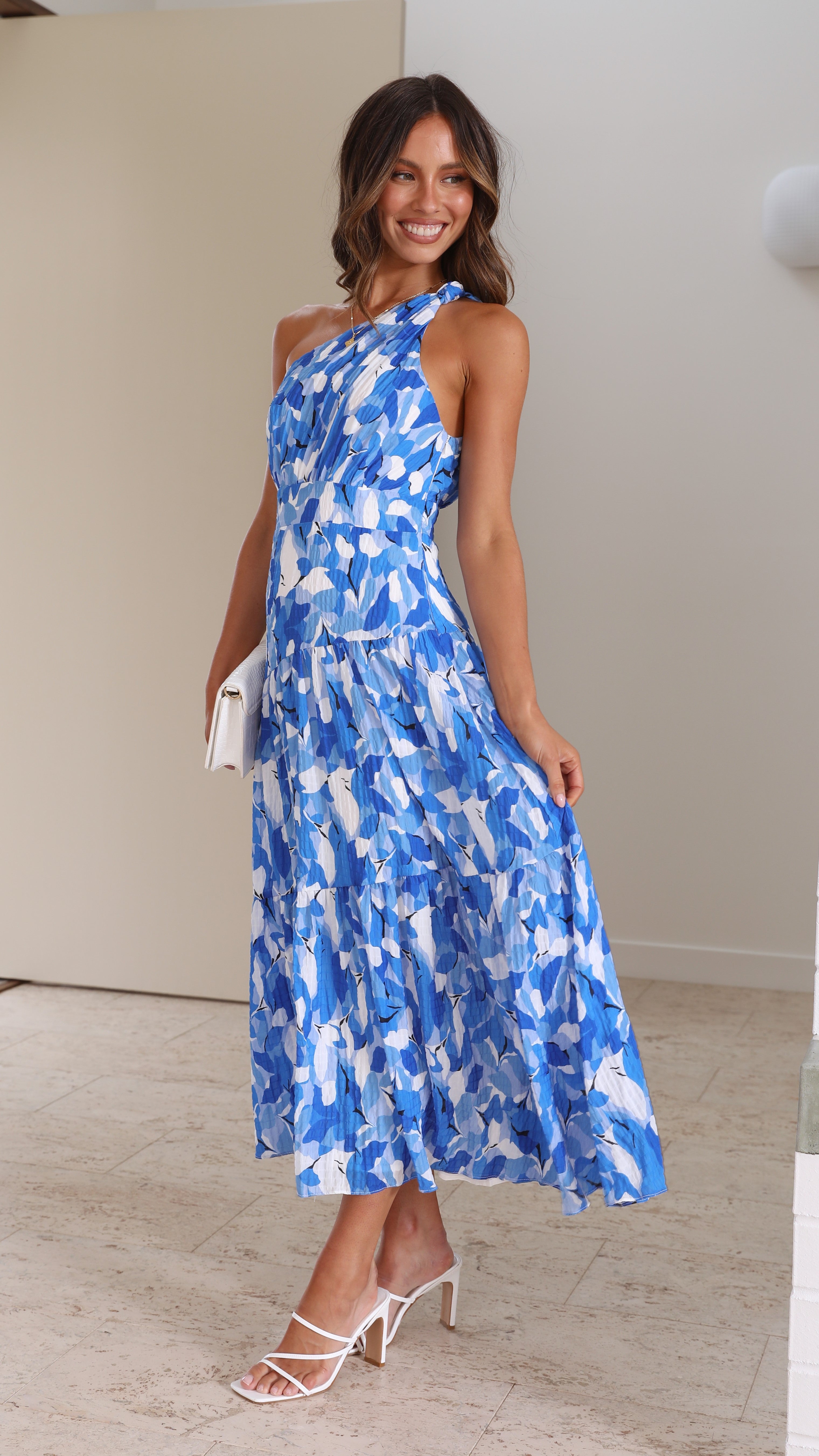 One-shoulder blue and white tiered midi dress side view