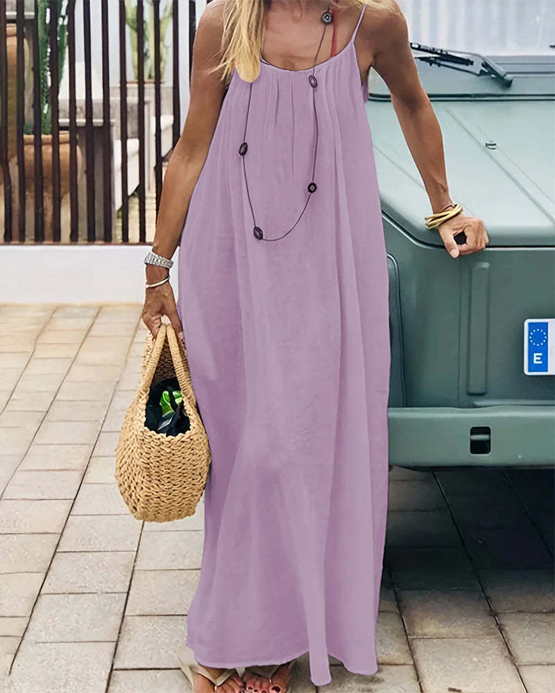 Lavender backless maxi dress detail showing pleated neckline and straps