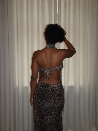 Tan leopard maxi dress with plunging V-neck and backless design