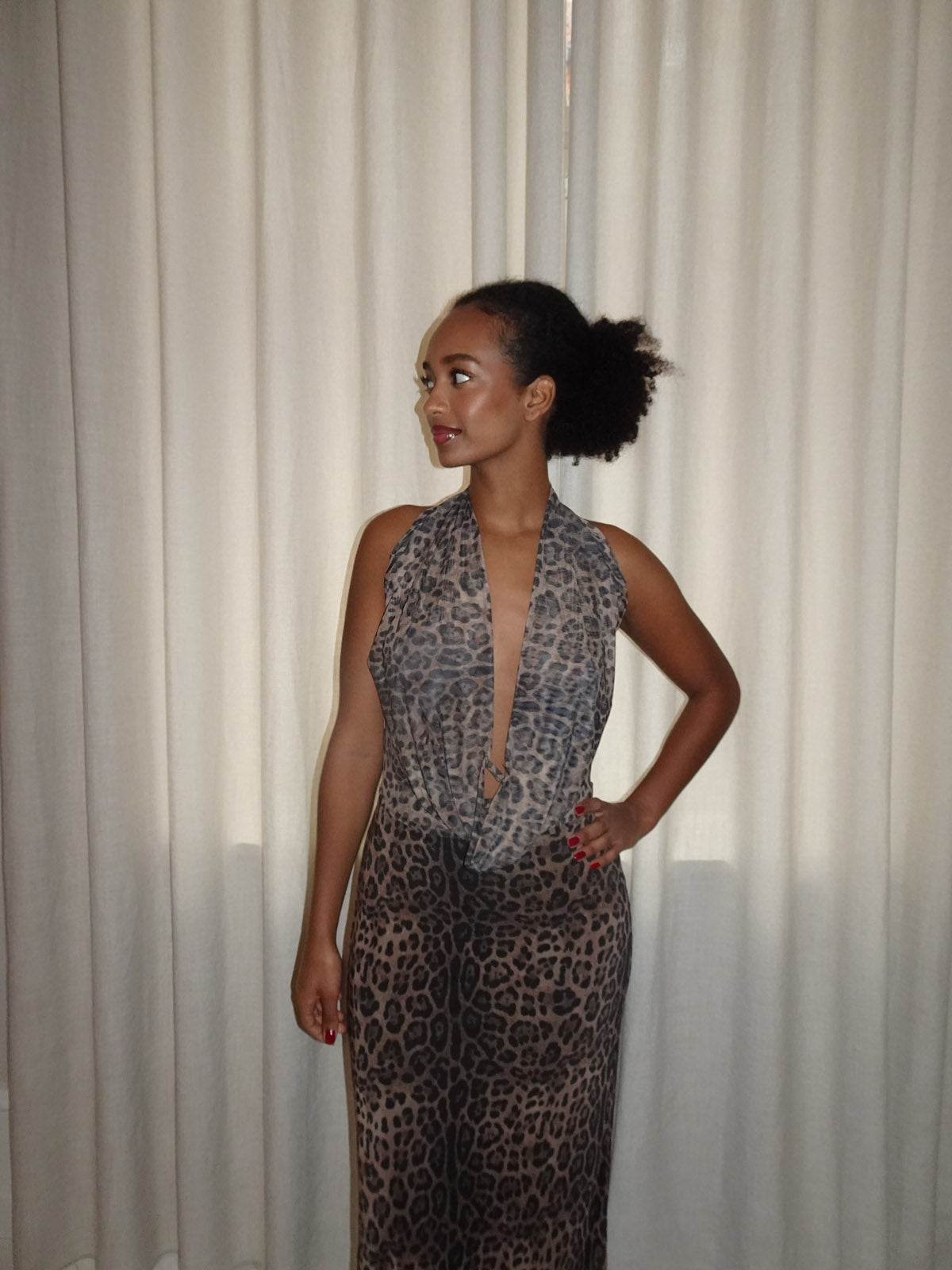 Gray leopard halter maxi dress with open back and deep V-neckline