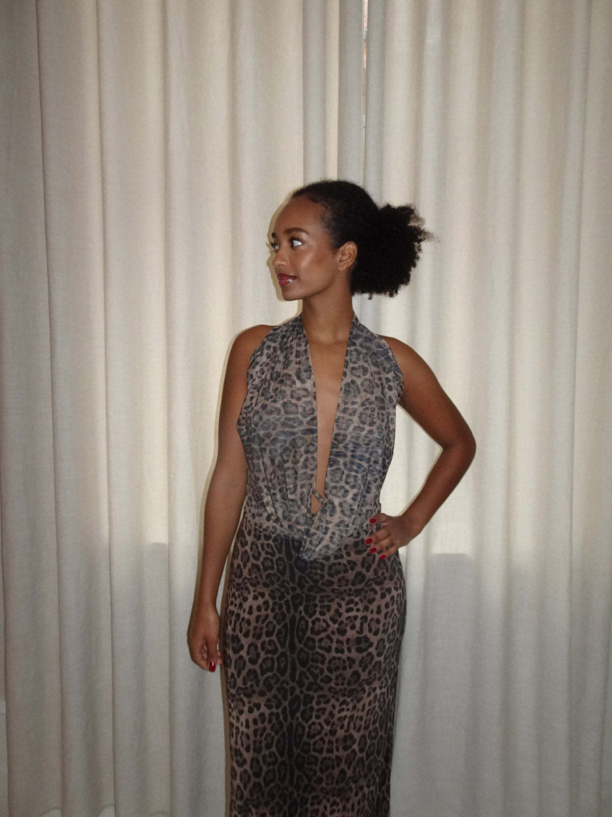 Gray leopard halter maxi dress with open back and deep V-neckline