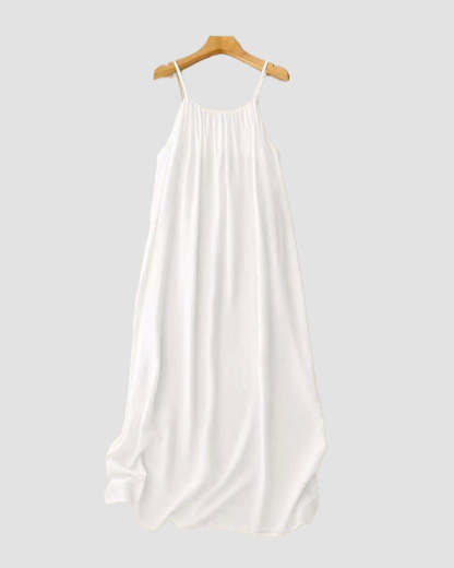Cream textured maxi dress on wooden hanger with gathered neckline