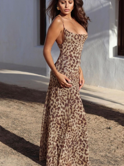 Side view of leopard print maxi dress showing backless design and fitted bodice