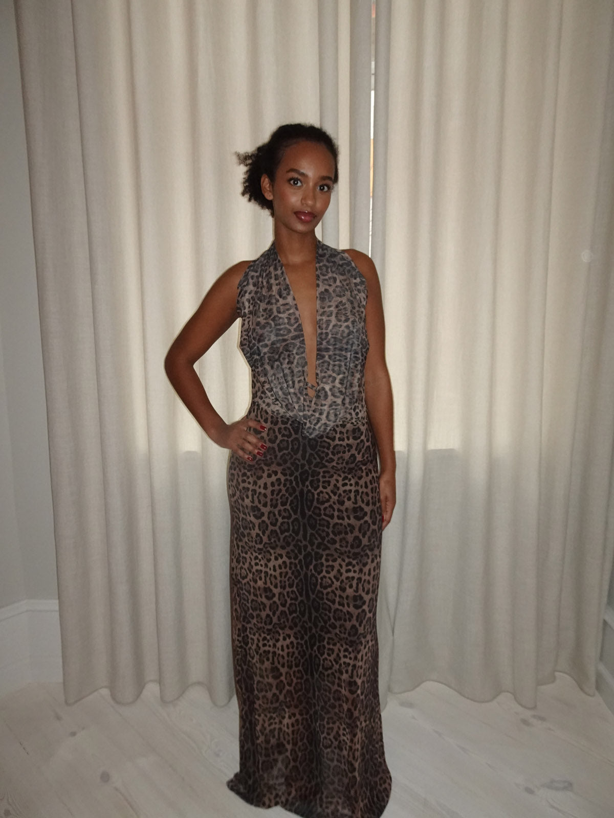 Leopard print halter maxi dress with plunging neckline, front view