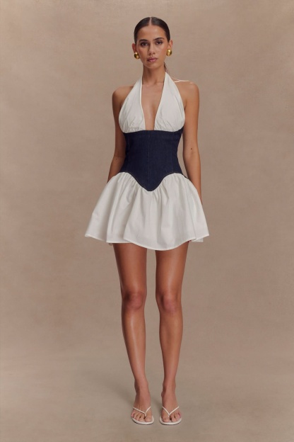 Halter corset mini dress with navy denim bodice and cream cotton skirt