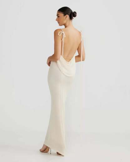 Cream sleeveless maxi dress with draped open back and adjustable ties for women