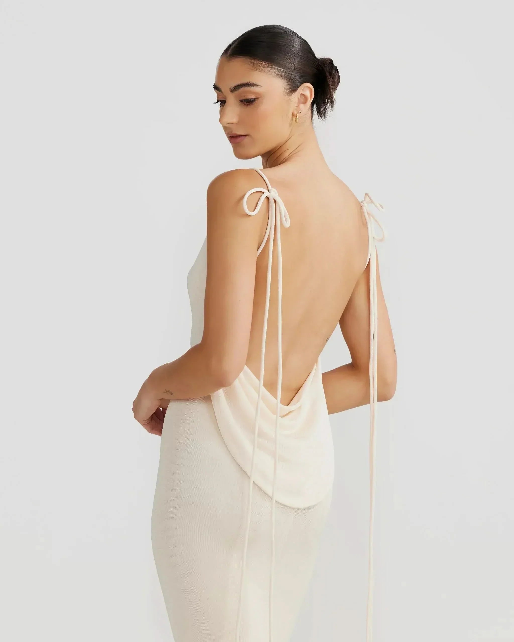 Cream cowl maxi dress with tie shoulder straps and low open back for women