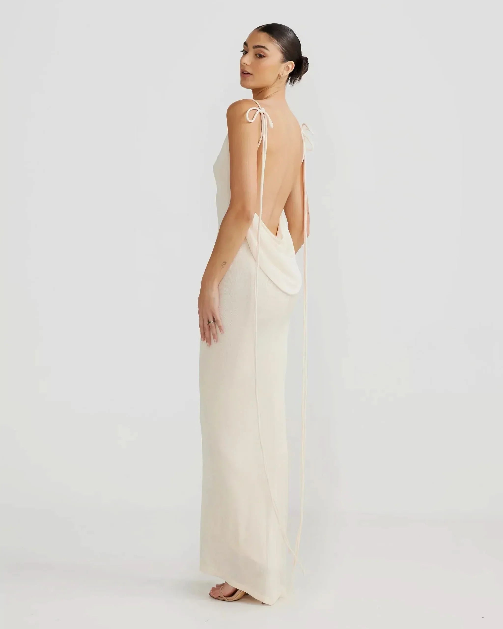 Cream backless cowl maxi dress with floor-length hem and draped back for women