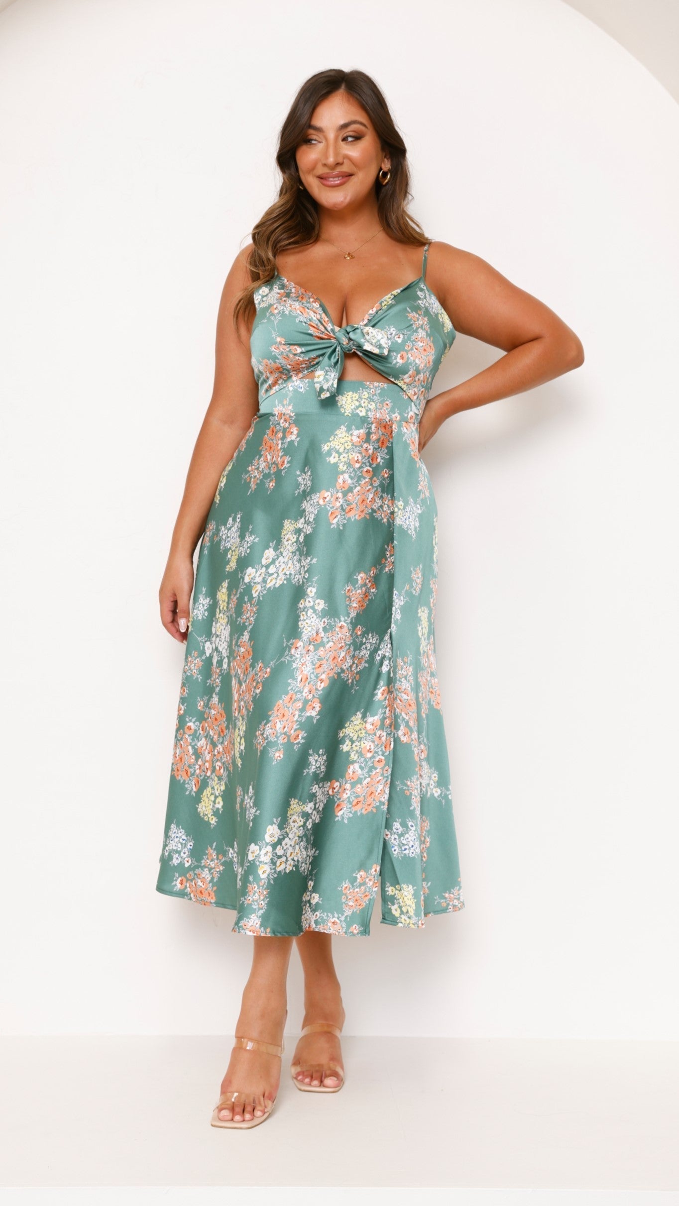Full-length green floral midi dress with V-neckline and center cutout