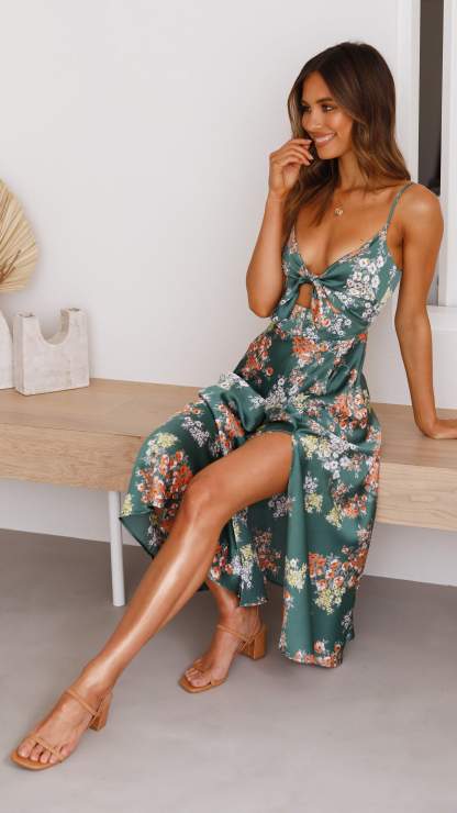 Green floral midi dress with front cutout tie detail and spaghetti straps