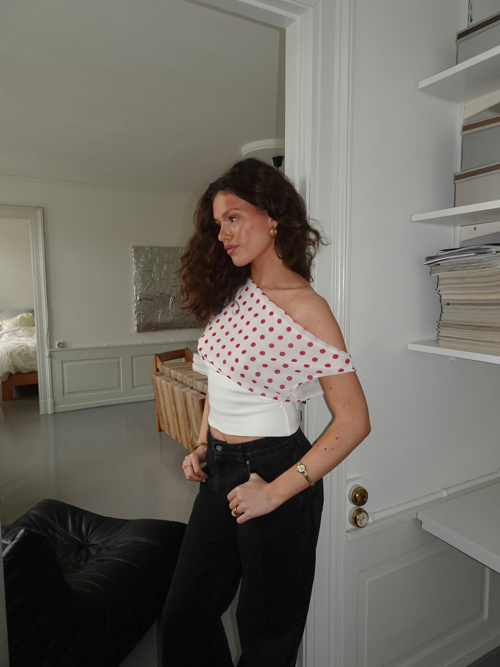 White and red polka dot crop top with draped shoulder design