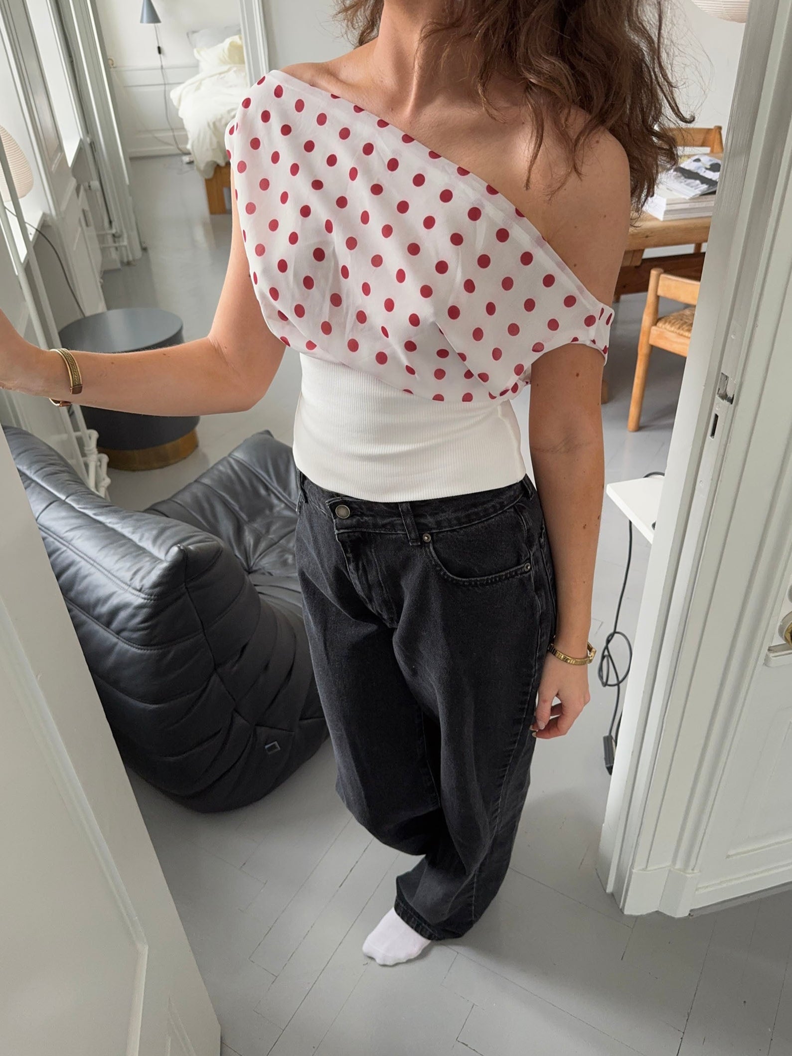White draped crop top with red polka dots and ribbed waistband
