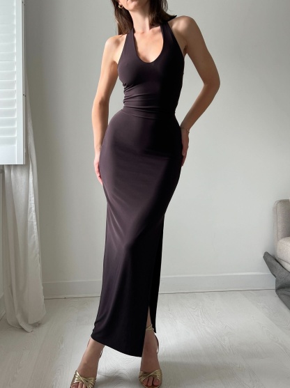 Black halter maxi dress with wrapped waist detail and slit