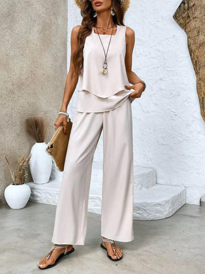 Cream layered sleeveless top with beige wide-leg pants