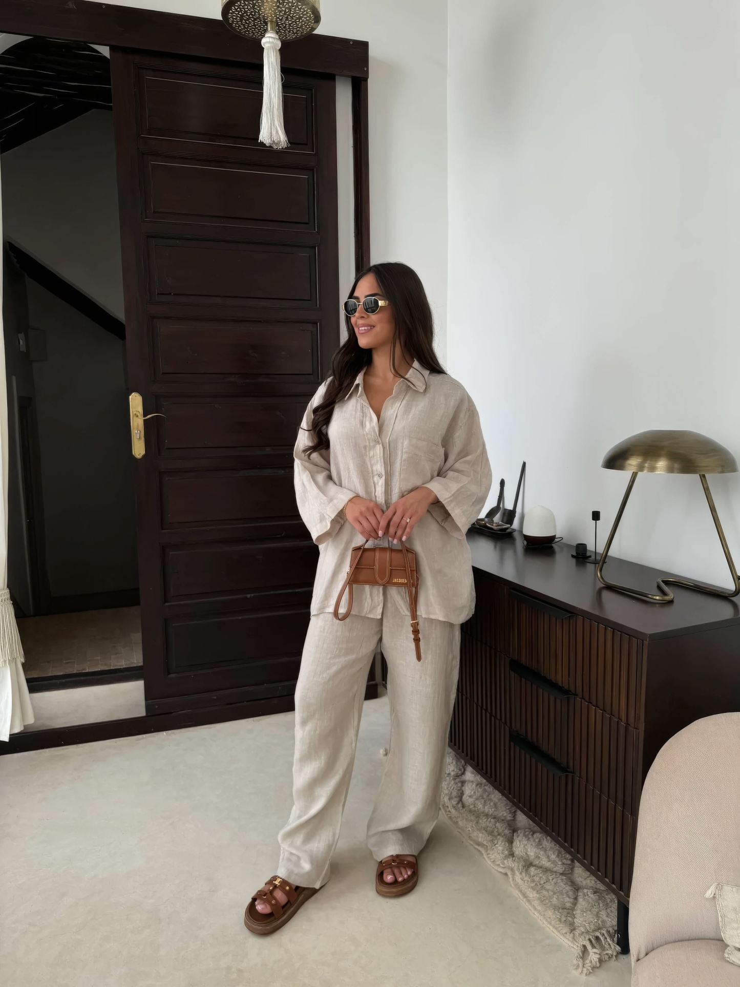 Cream linen button-front shirt with straight pants