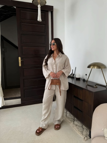 Cream linen button-front shirt with straight pants