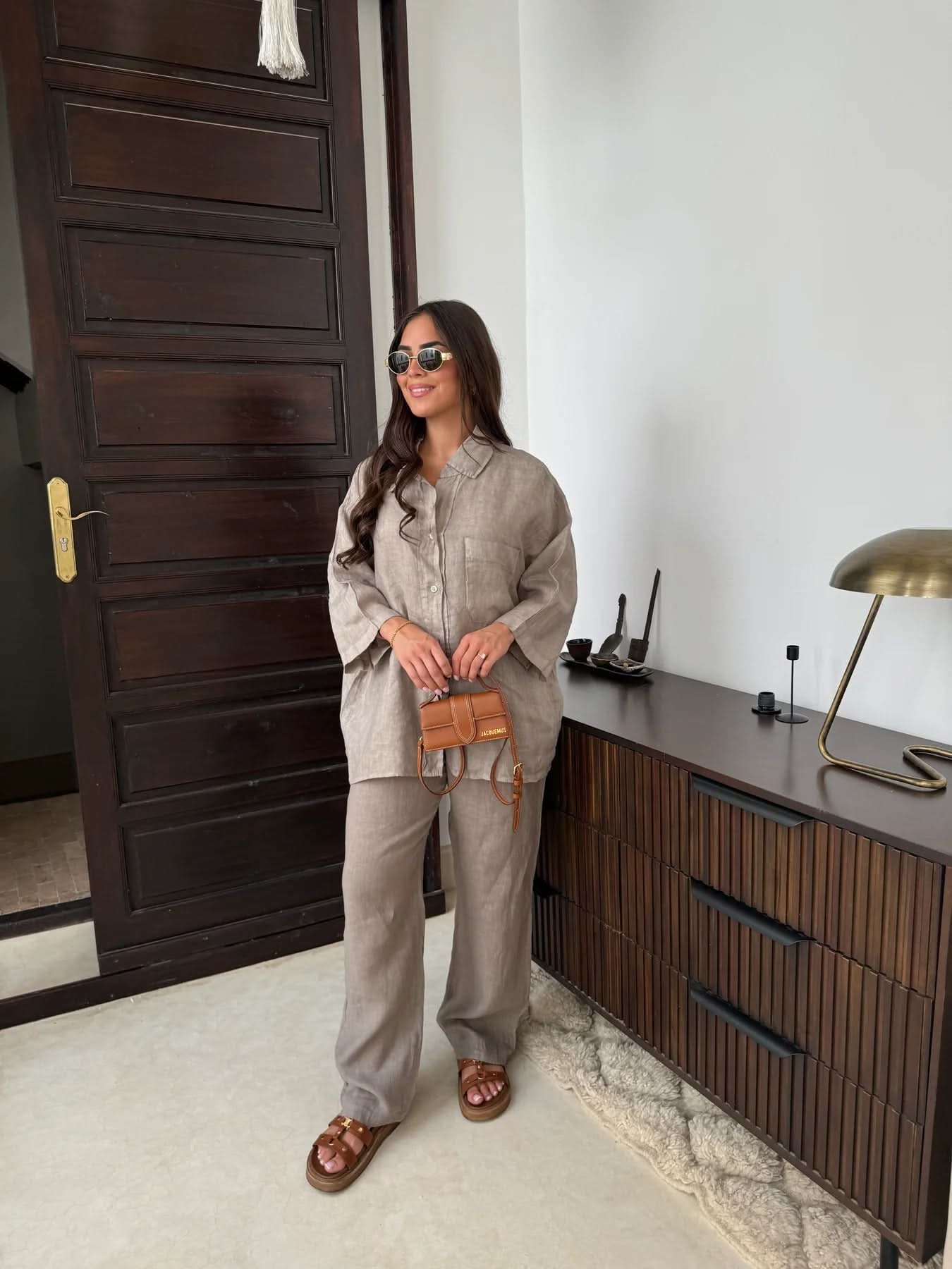 Taupe linen collared shirt paired with matching trousers