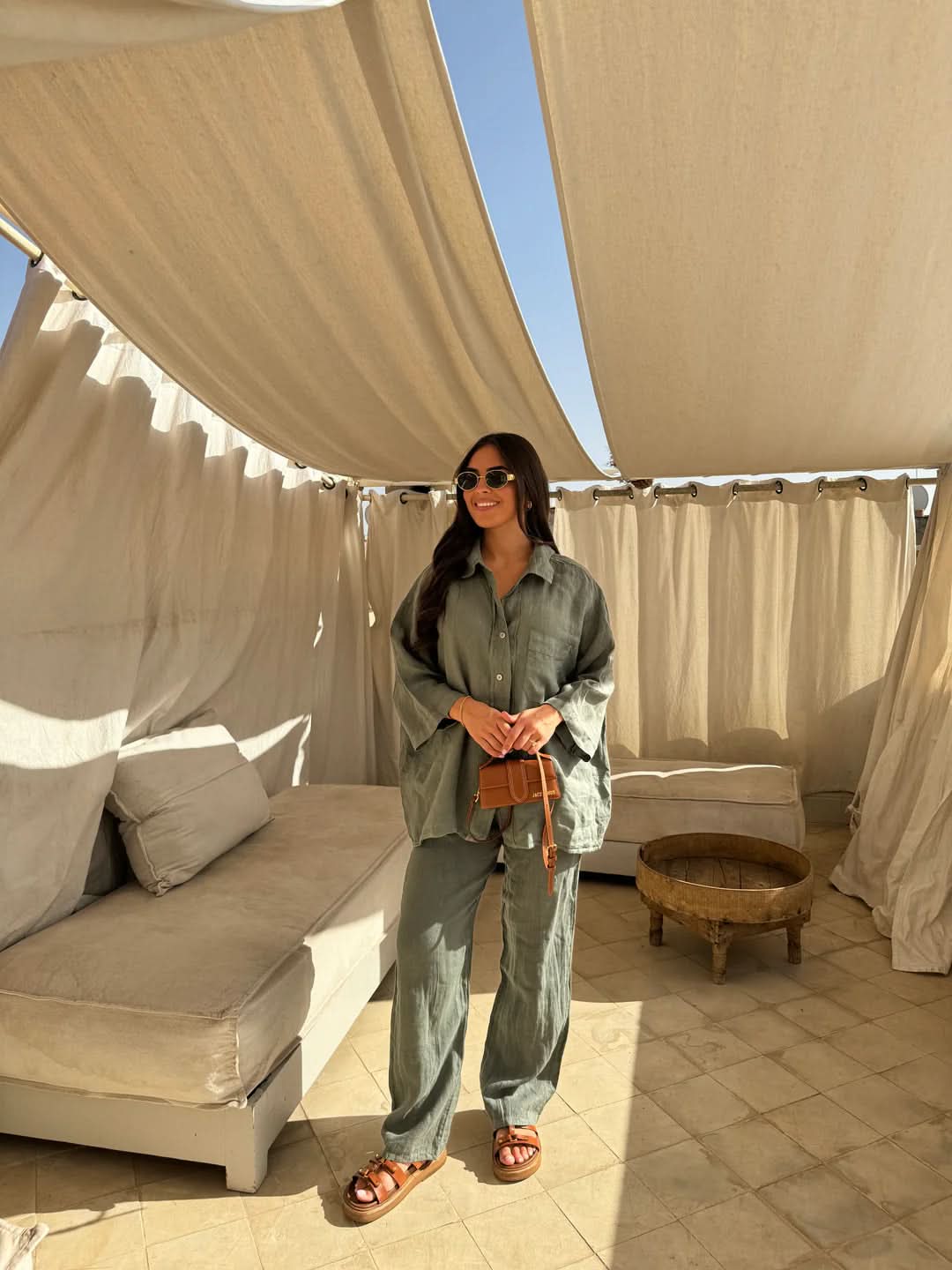 Sage green linen button-up shirt and wide-leg pants set