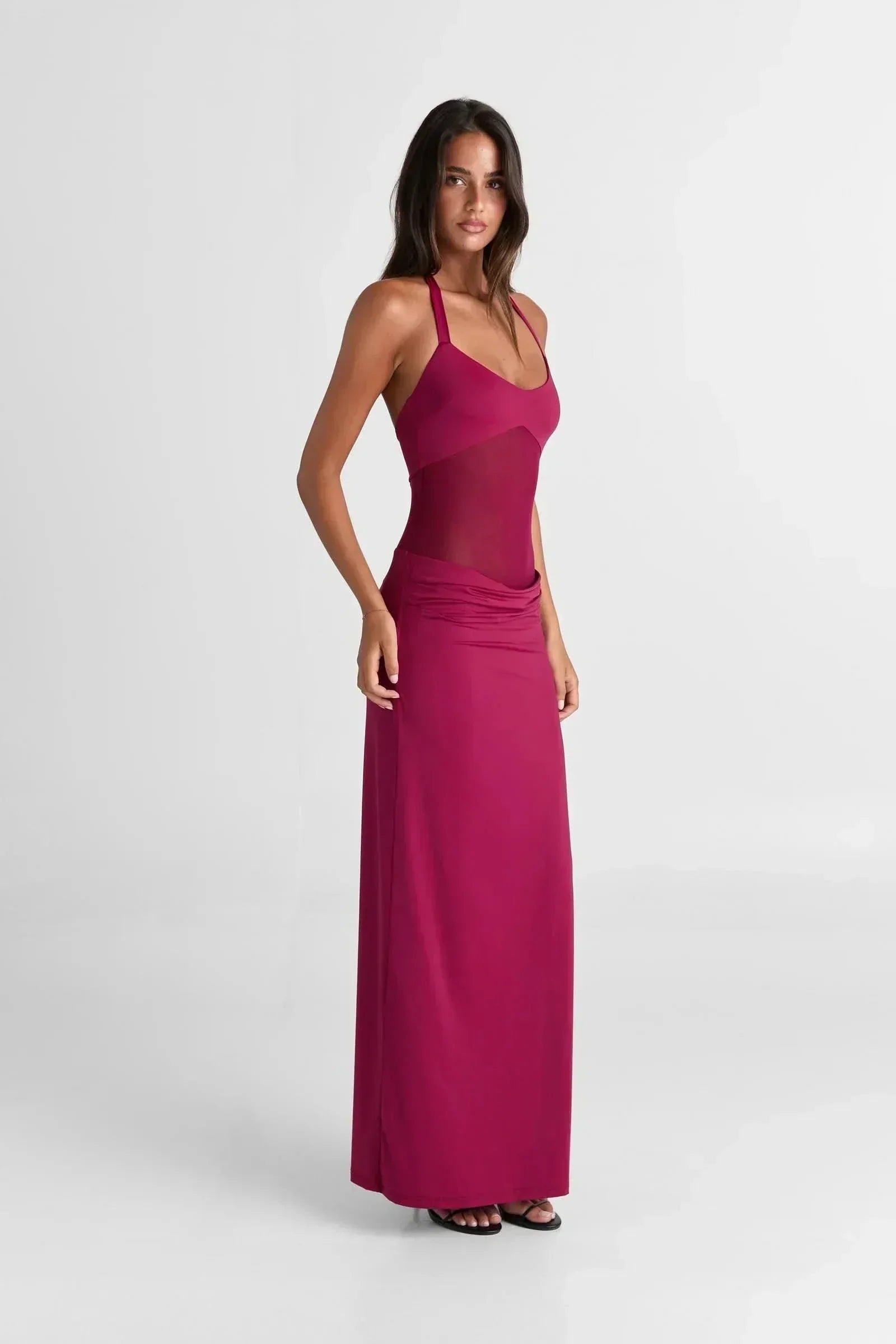 Magenta sleeveless maxi dress with sheer mesh bodice and gathered waist