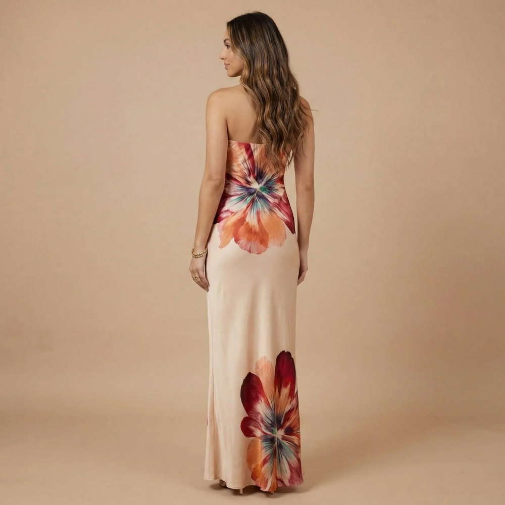 Back view of cream bandeau maxi dress with strategic placement blooms