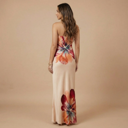 Back view of cream bandeau maxi dress with strategic placement blooms