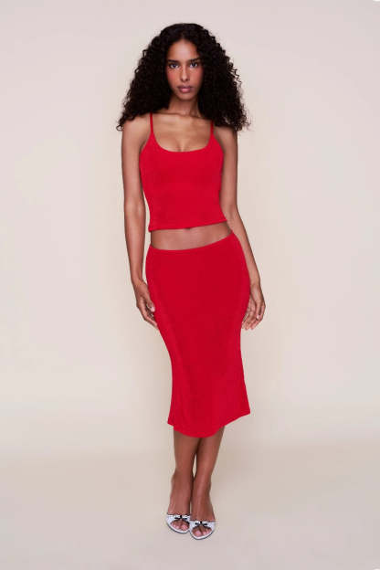 Full-length red ribbed two-piece midi set with crop top and fitted skirt