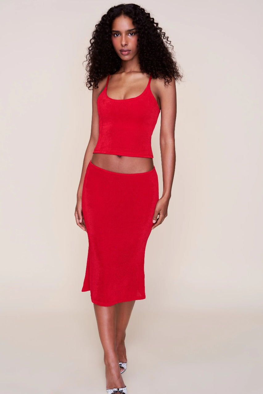 Red ribbed midi set front view showing fitted crop camisole and skirt silhouette
