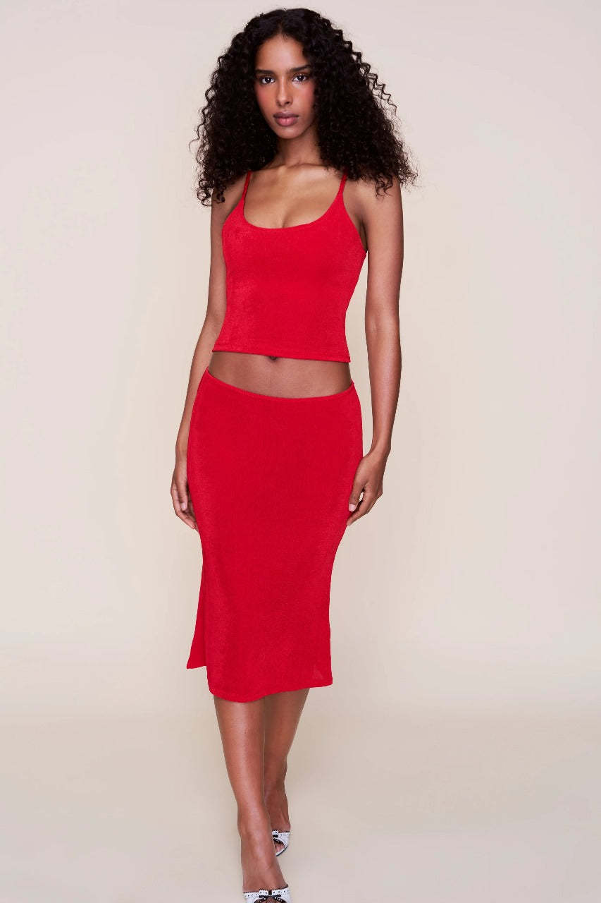 Red ribbed midi set front view showing fitted crop camisole and skirt silhouette
