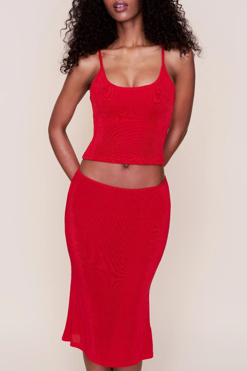 Red ribbed crop camisole and midi skirt set with cutout waist detail