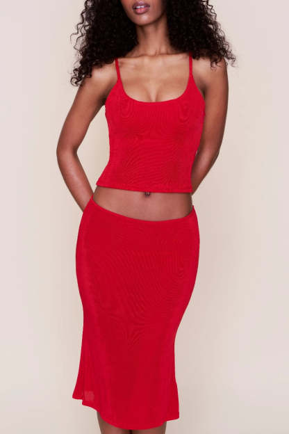 Red ribbed crop camisole and midi skirt set with cutout waist detail