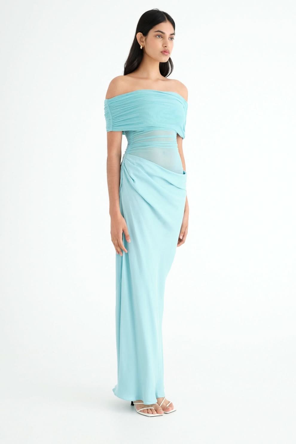 Side view of turquoise ruched maxi dress with off-shoulder neckline